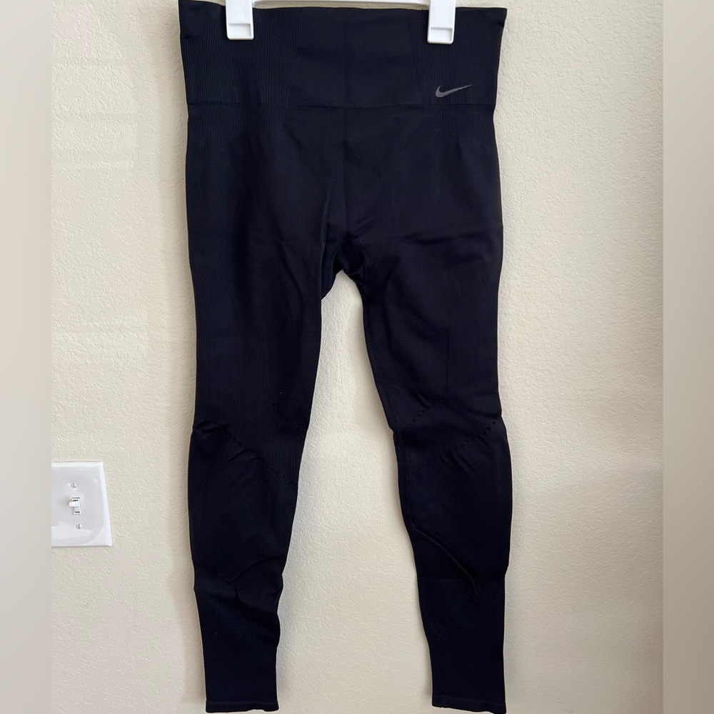 Nike women’s running leggings, size M, black
